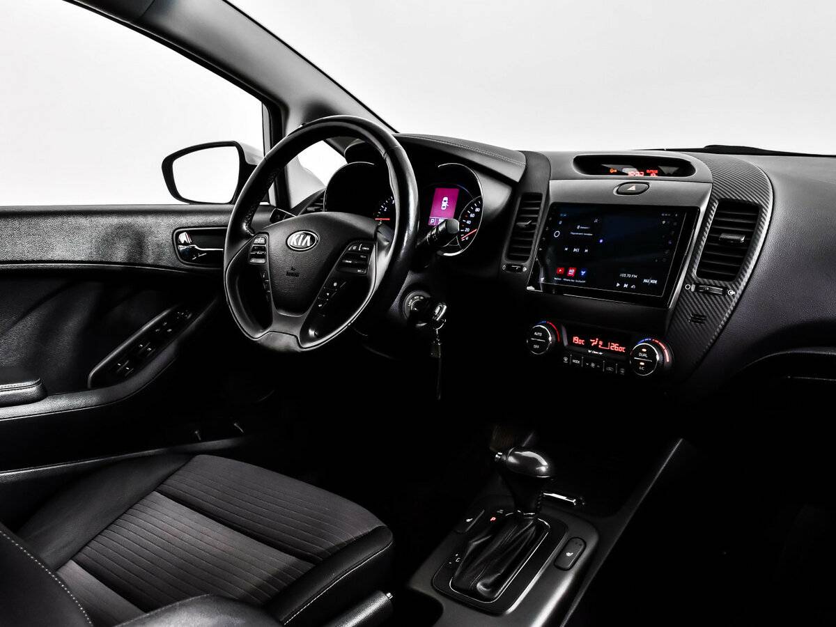 Kia Cerato 2013 года с пробегом. Фото: #10