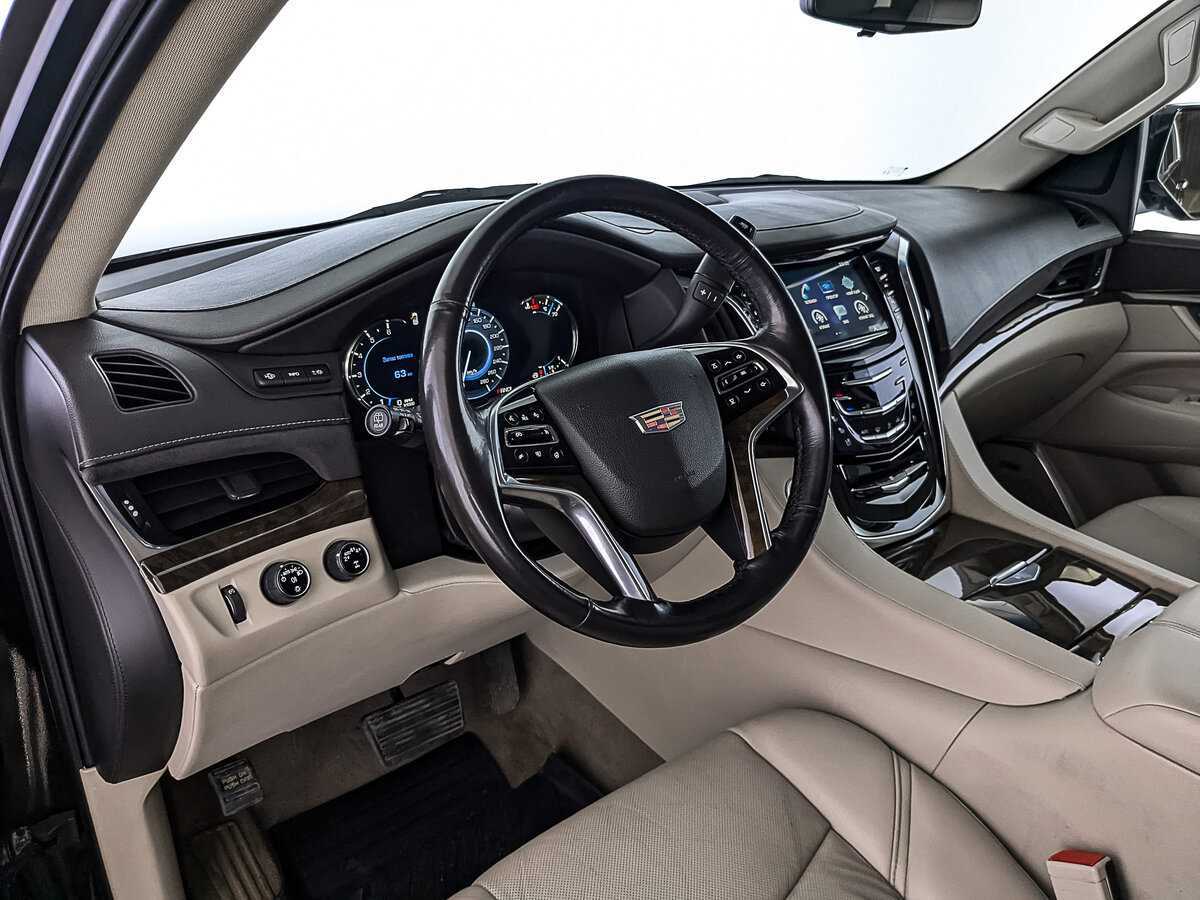 Cadillac Escalade 2018 года с пробегом. Фото: #14