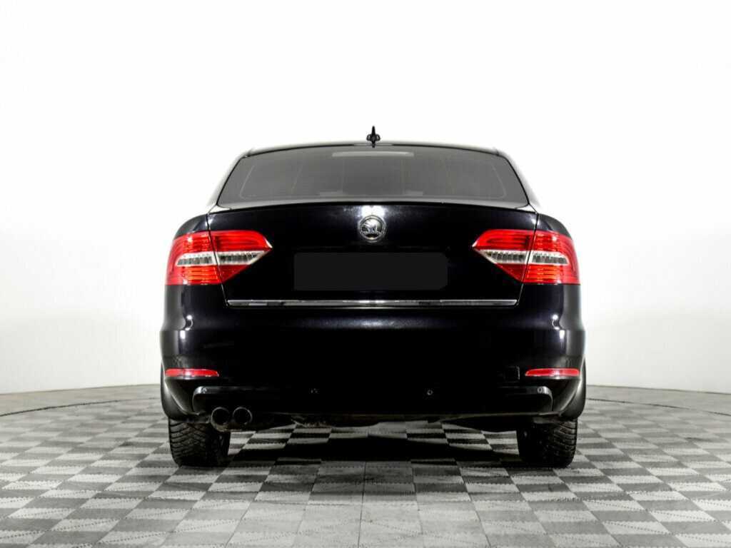 Skoda Superb 2013 года с пробегом. Фото: #4