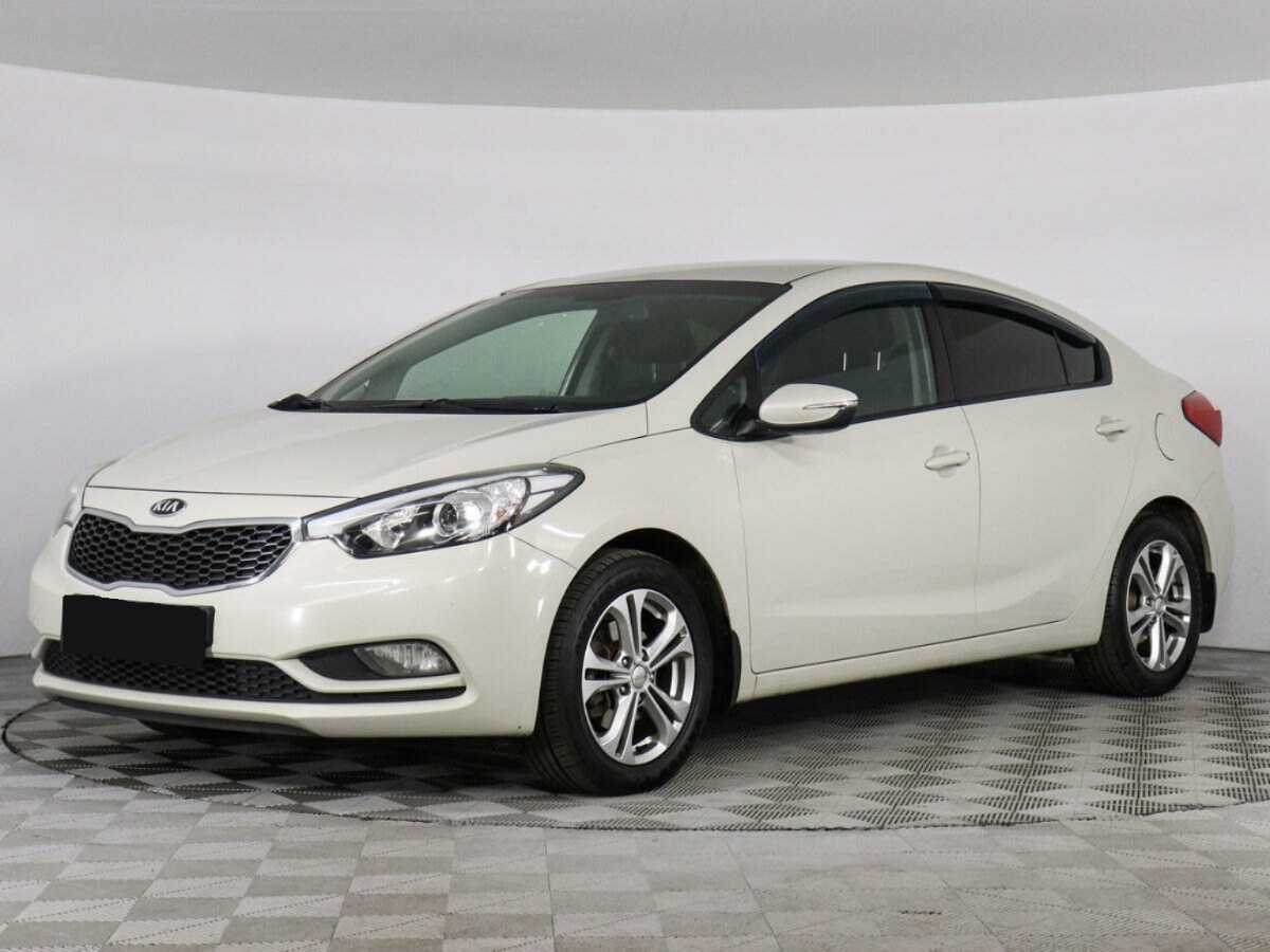 Kia Cerato 2013 года с пробегом. Посмотреть фото