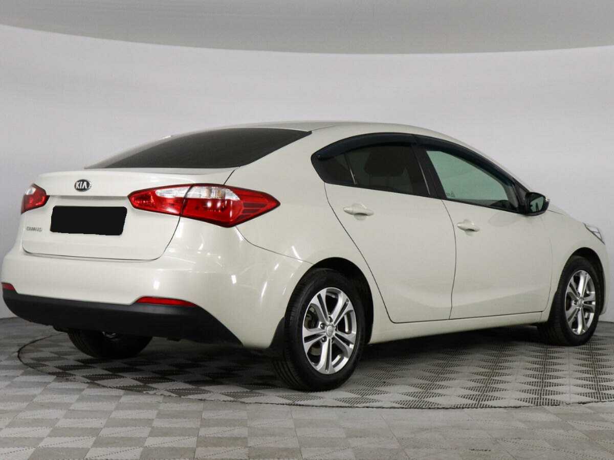 Kia Cerato 2013 года с пробегом. Фото: #4