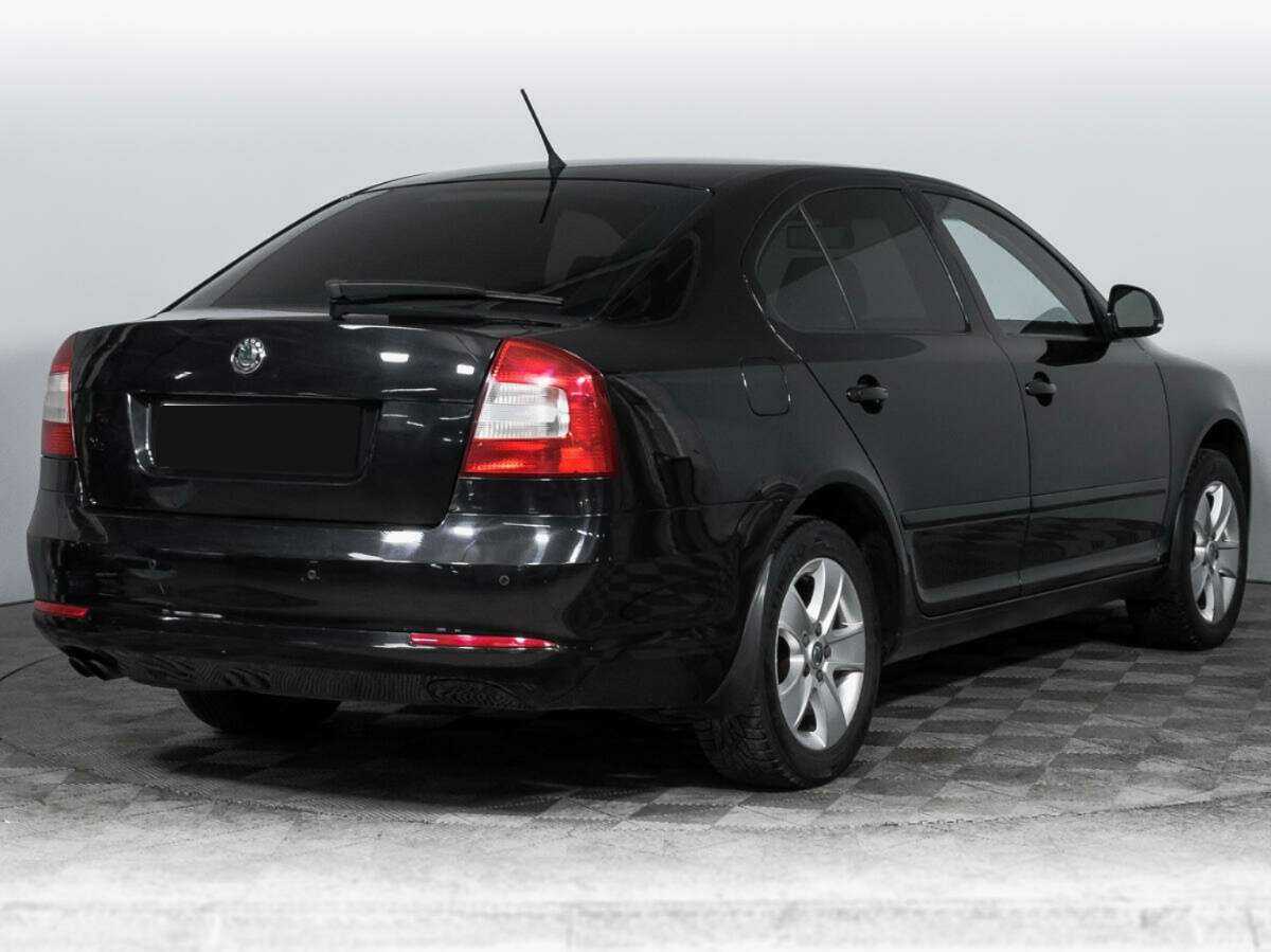 Skoda Octavia 2011 года с пробегом. Фото: #4