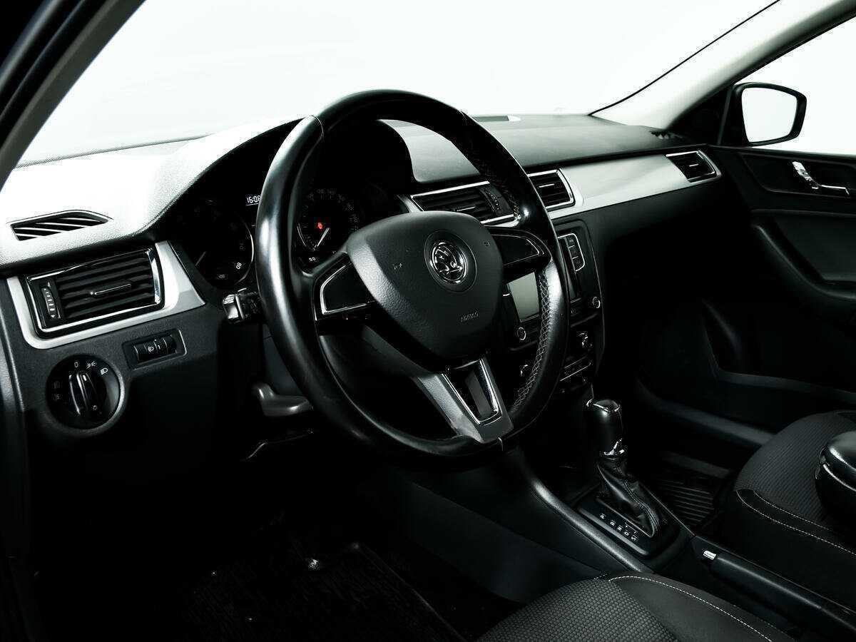 Skoda Rapid 2014 года с пробегом. Фото: #12