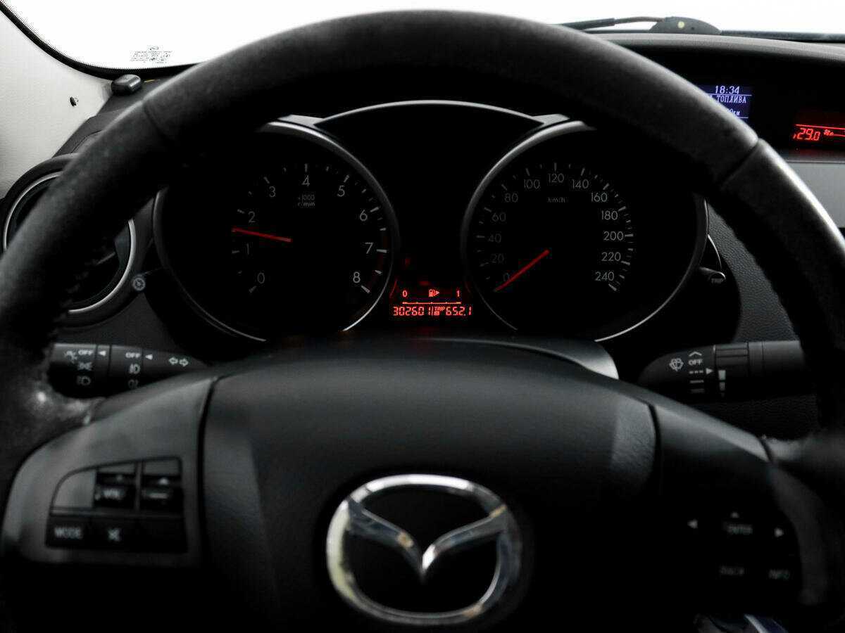 Mazda 3 2010 года с пробегом. Фото: #14