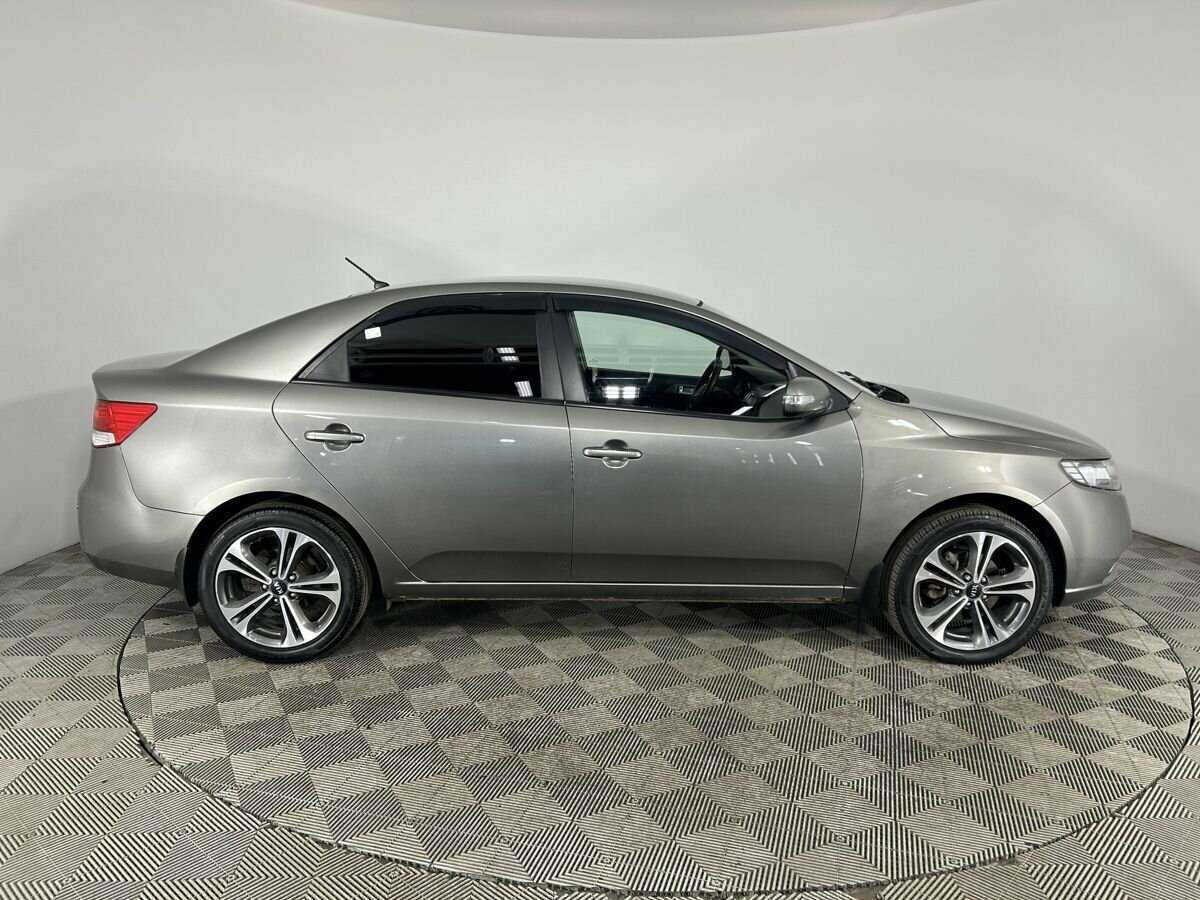 Kia Cerato 2010 года с пробегом. Фото: #2