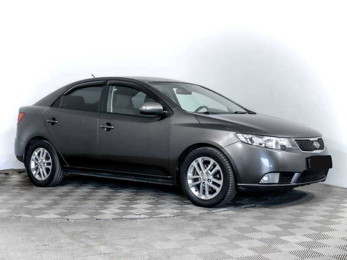 Kia Cerato 2010 года с пробегом. Фото: #2