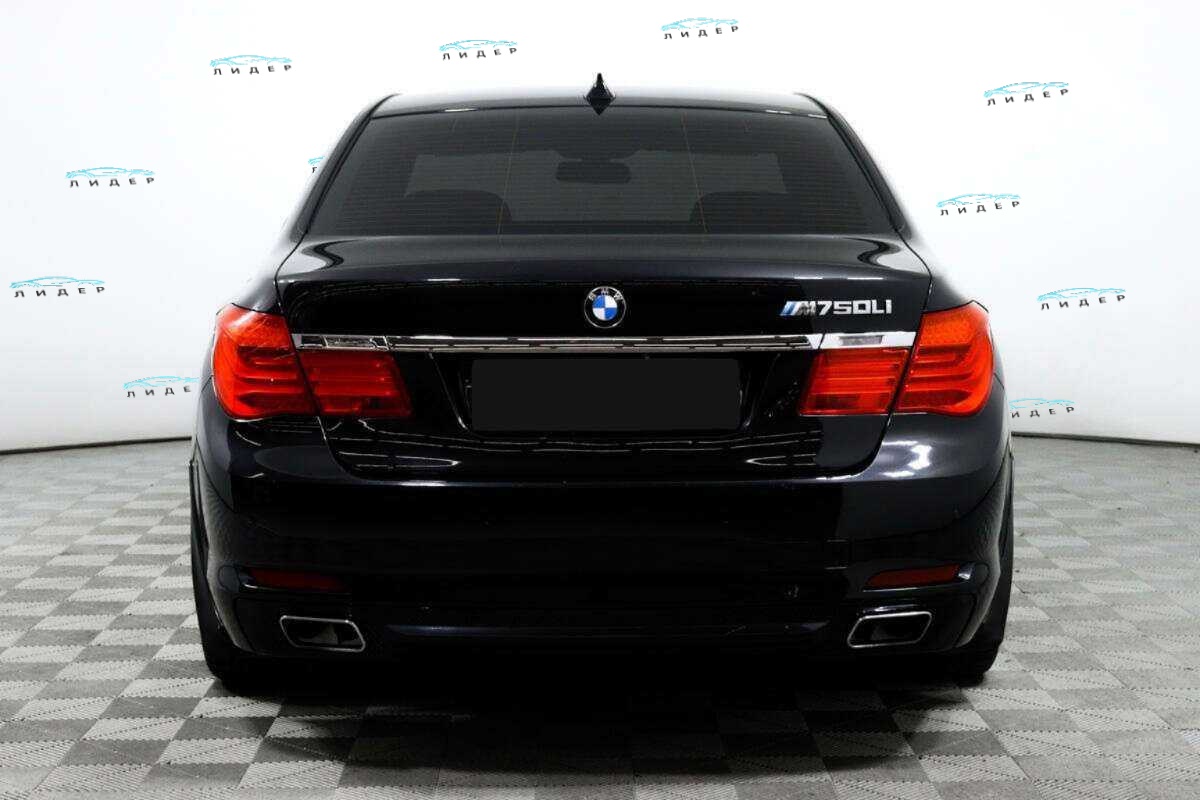 Б/У БМВ 7 серии 2011 года. Фото: #4