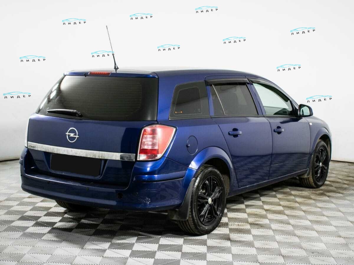Б/У Опель Астра 2010 года. Фото: #4