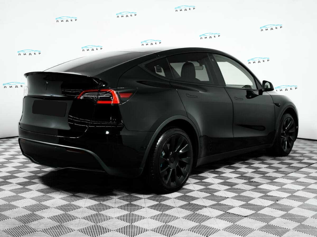 Б/У Тесла Модел У 2021 года. Фото: #4