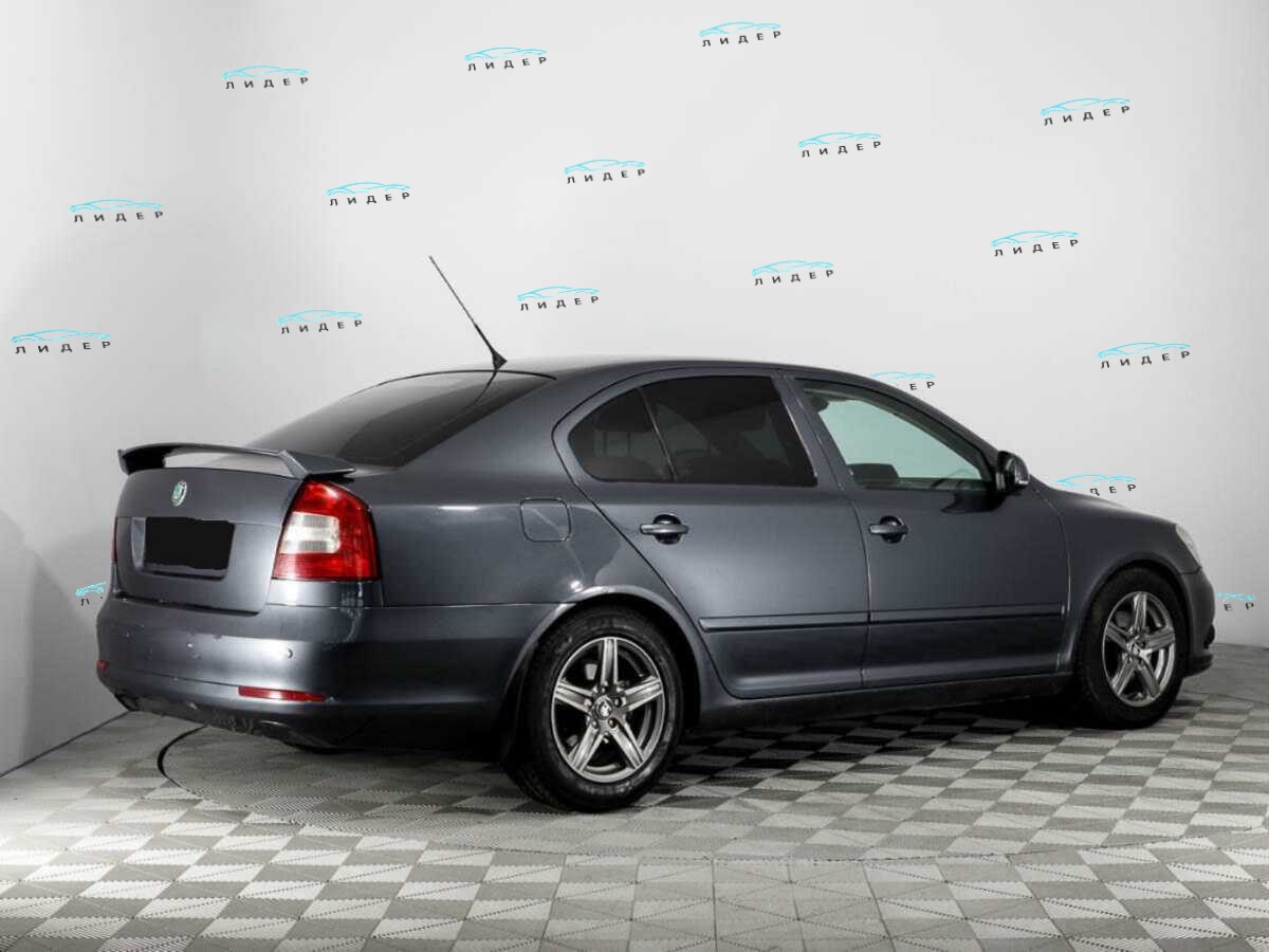 Б/У Шкода Октавия 2011 года. Фото: #4