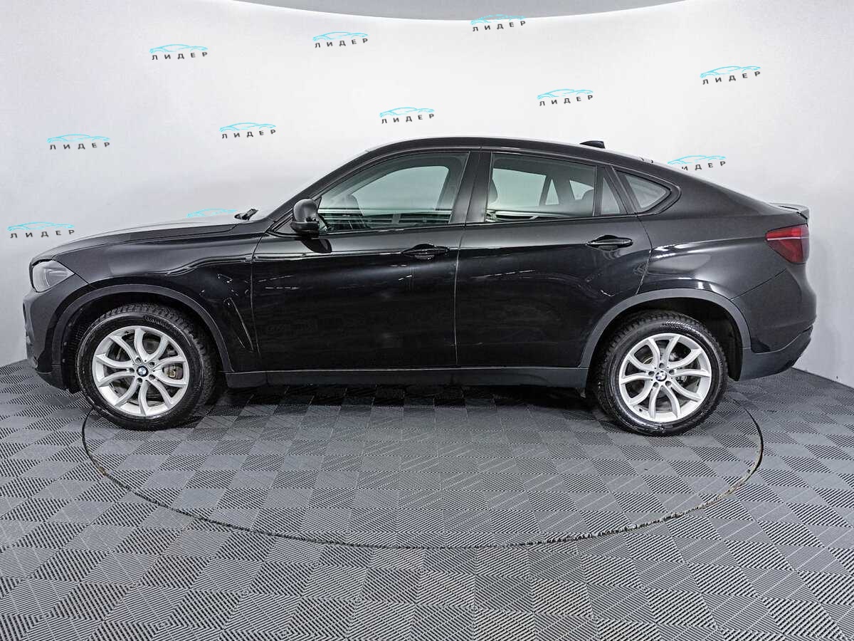 Б/У БМВ Икс6 2015 года. Фото: #7