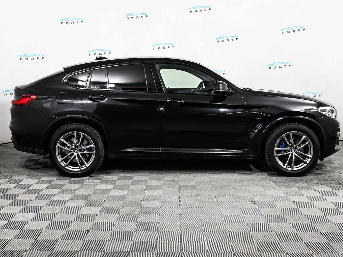Б/У БМВ Икс4 2021 года. Фото: #3