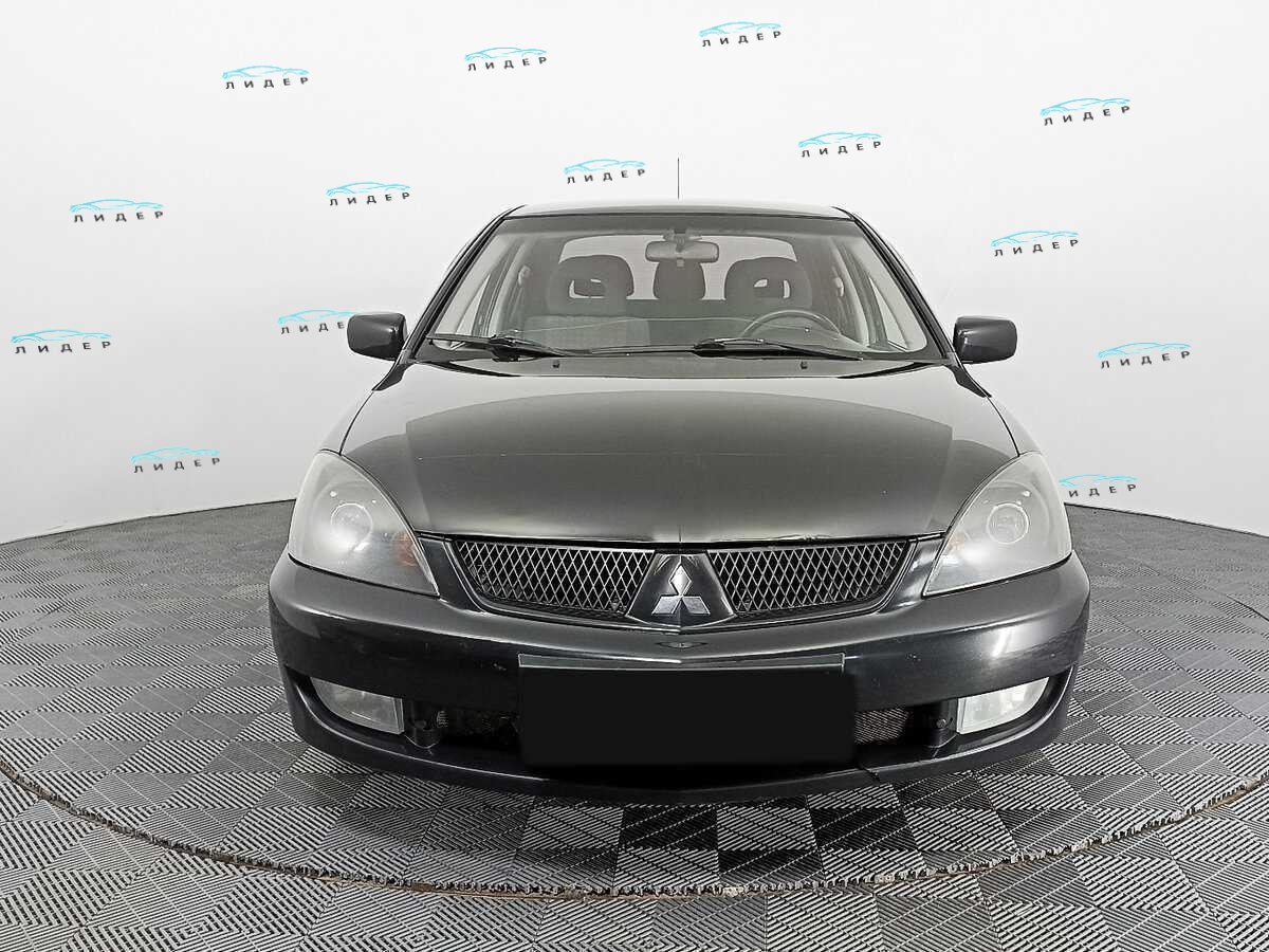 Б/У Митсубиши Лансер 2009 года. Фото: #1