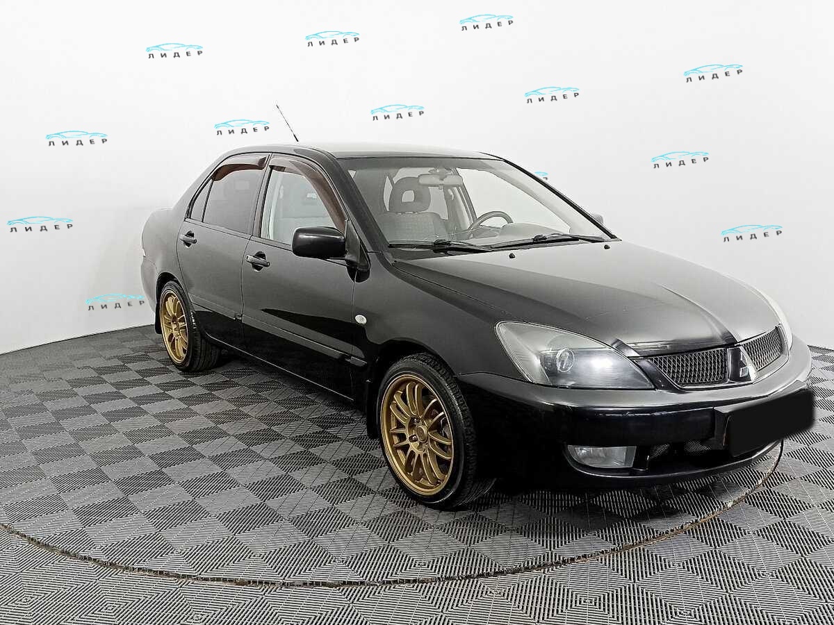 Б/У Митсубиши Лансер 2009 года. Фото: #2