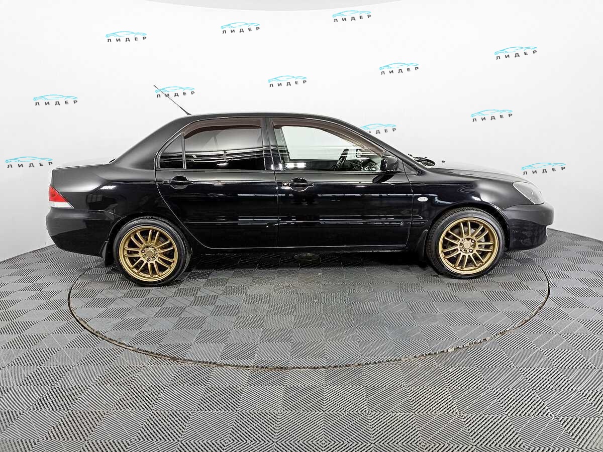 Б/У Митсубиши Лансер 2009 года. Фото: #3