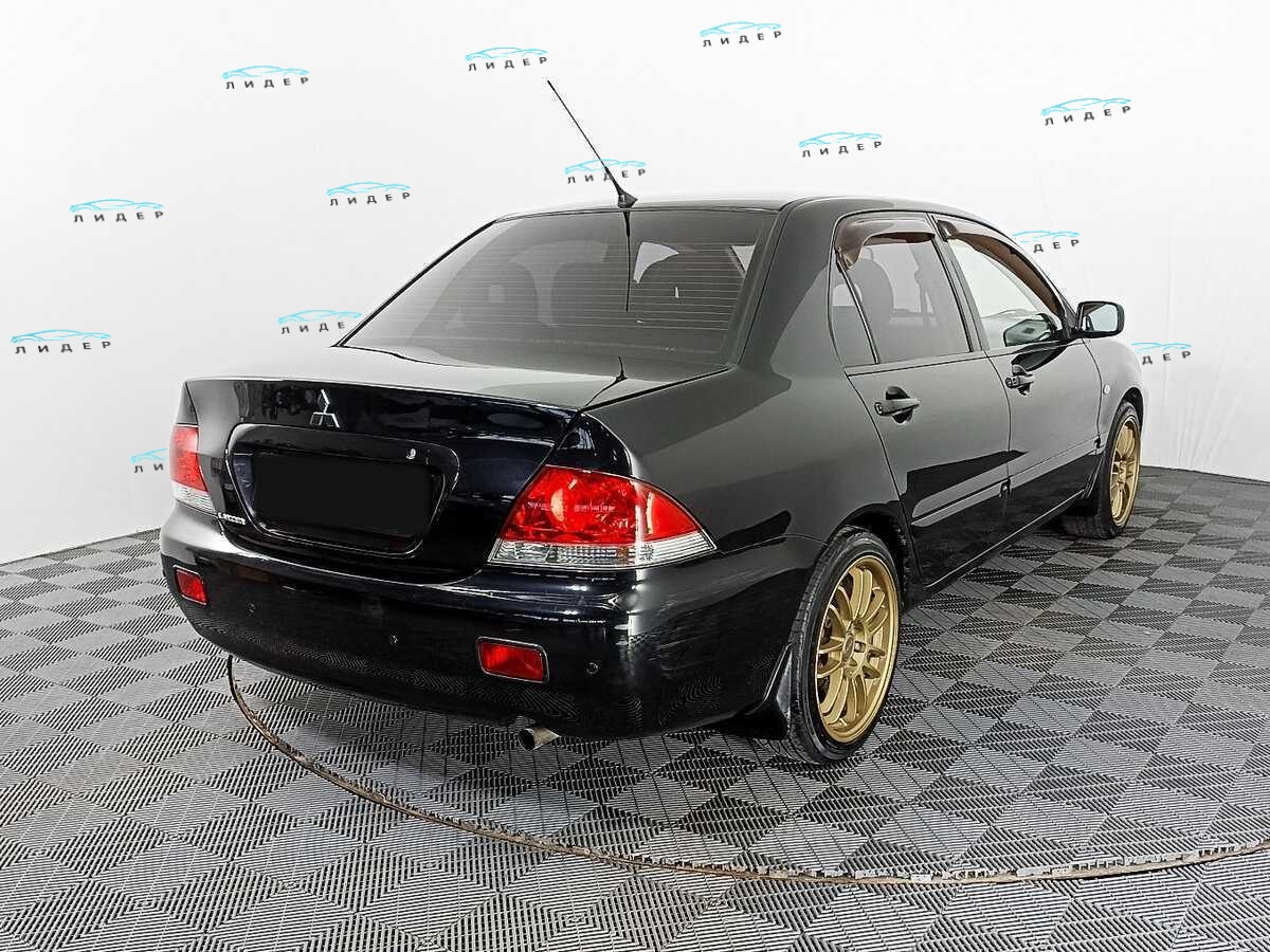 Б/У Митсубиши Лансер 2009 года. Фото: #4
