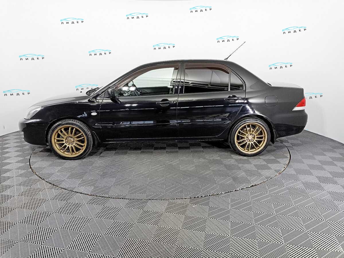 Б/У Митсубиши Лансер 2009 года. Фото: #7