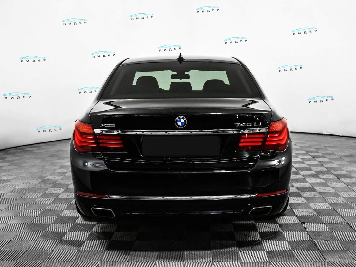 Б/У БМВ 7 серии 2012 года. Фото: #4