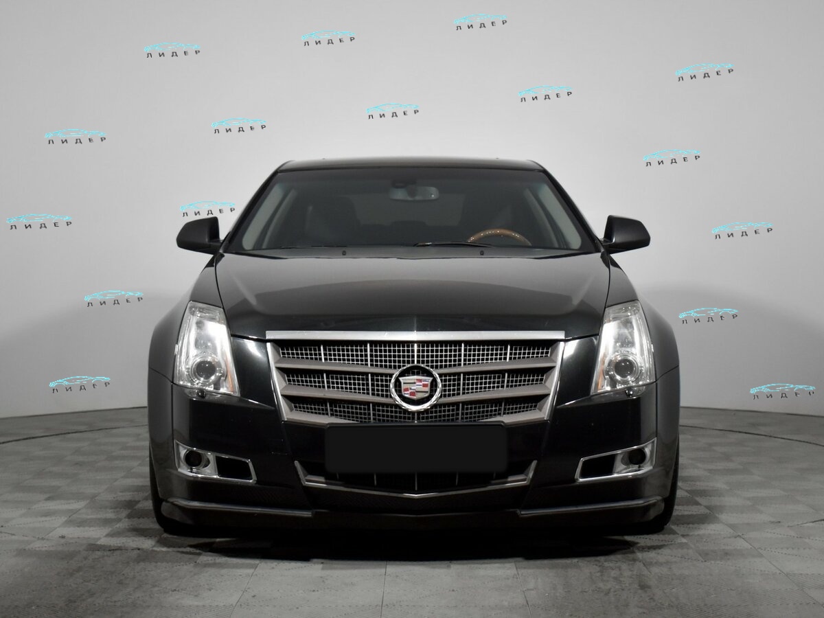 Б/У Кадиллак КТС 2011 года. Фото: #1