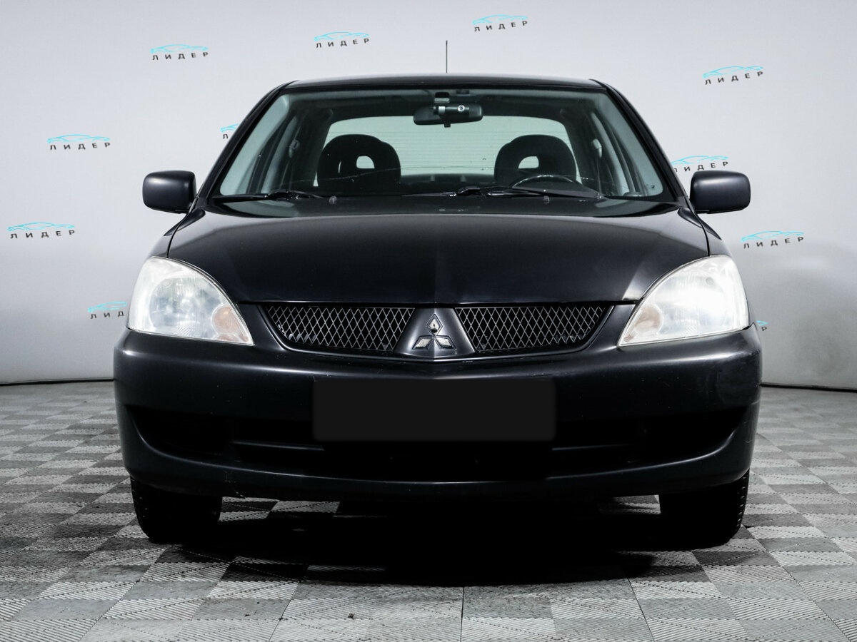 Mitsubishi Lancer 2009 года с пробегом. Фото: #1