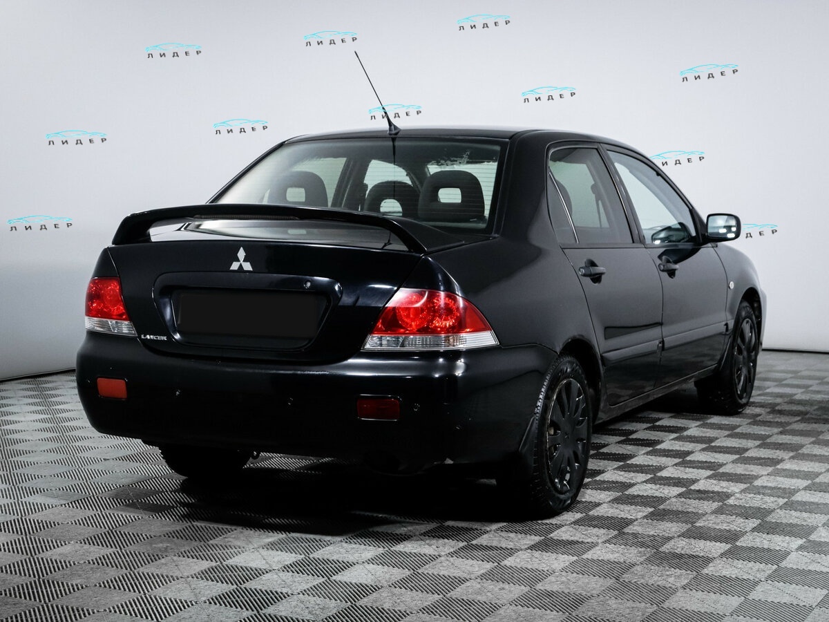 Mitsubishi Lancer 2009 года с пробегом. Фото: #3