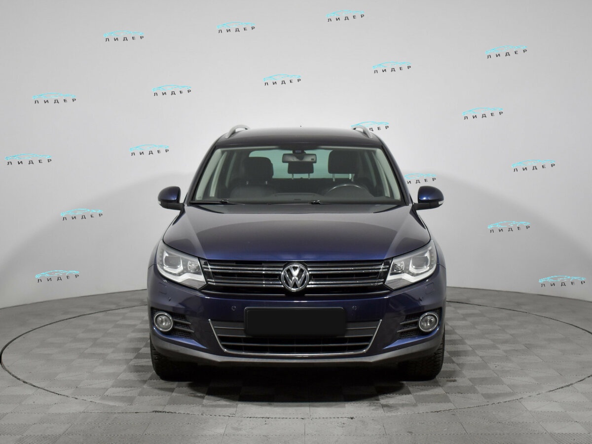 Volkswagen Tiguan 2011 года с пробегом. Фото: #1