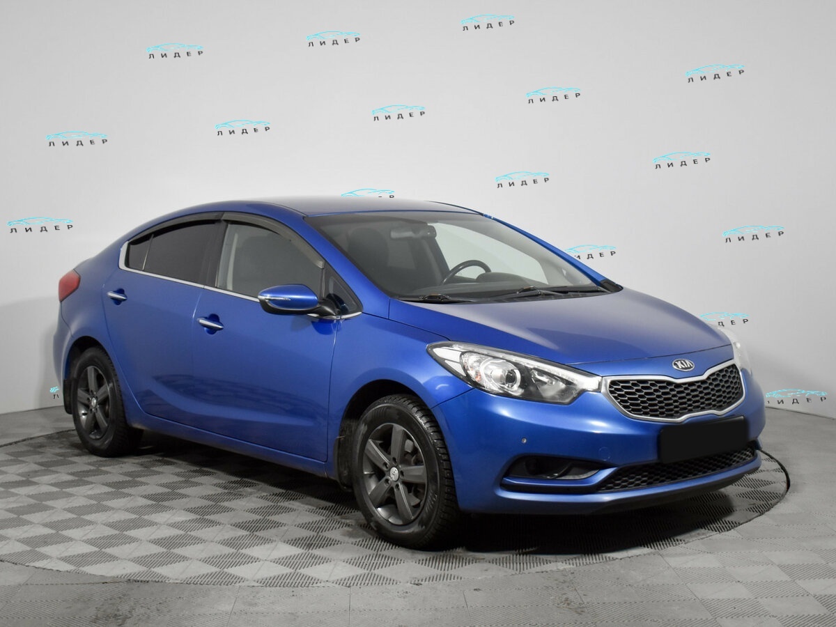 Kia Cerato 2014 года с пробегом. Фото: #2