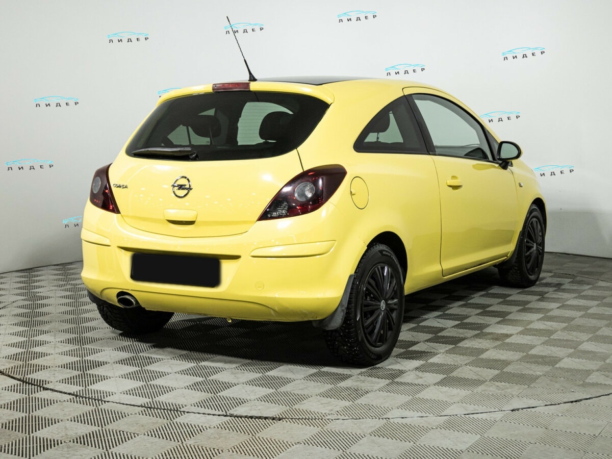 Opel Corsa 2011 года с пробегом. Фото: #4