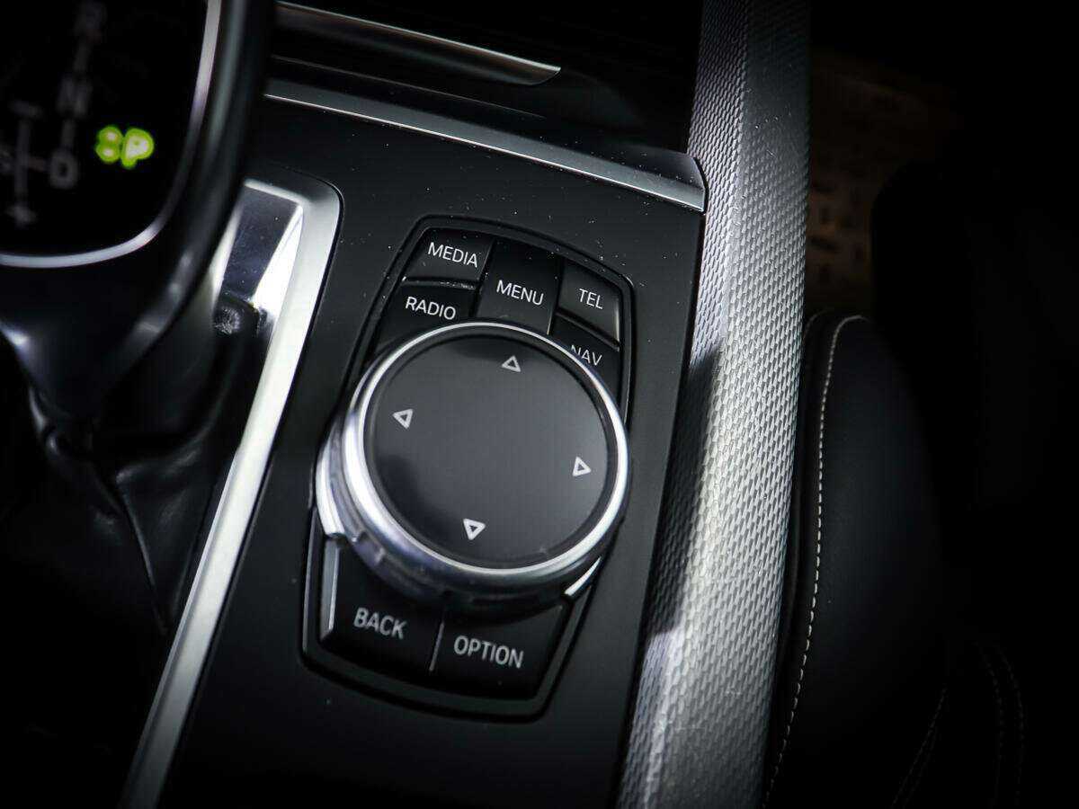 Б/У БМВ Икс5 2014 года. Фото: #18