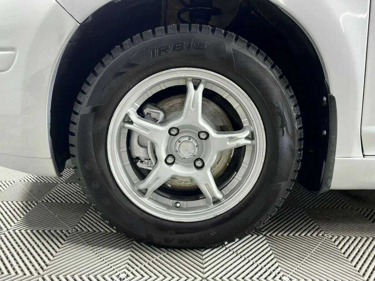 Б/У Ниссан Тиида 2011 года. Фото: #15