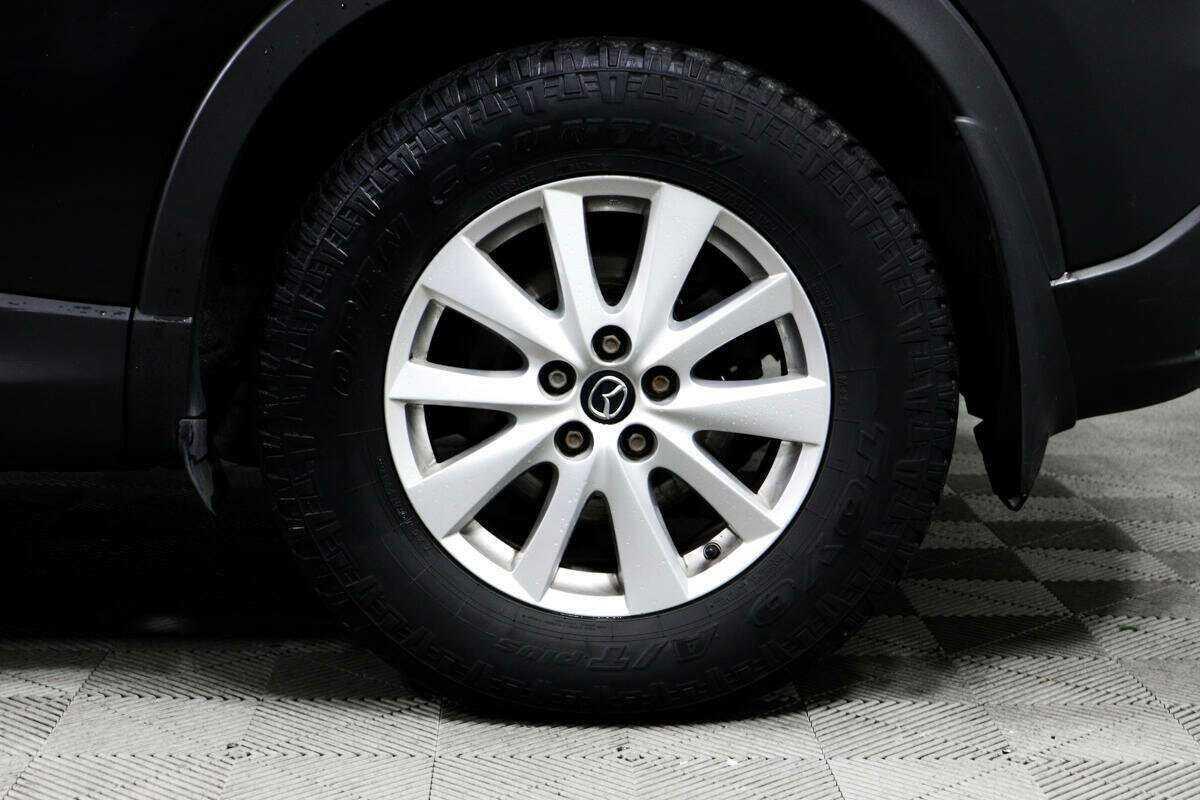 Б/У Мазда Ц-Икс-5 2011 года. Фото: #13