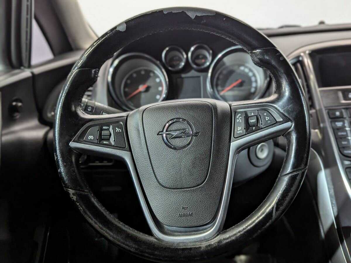 Б/У Опель Астра 2011 года. Фото: #9