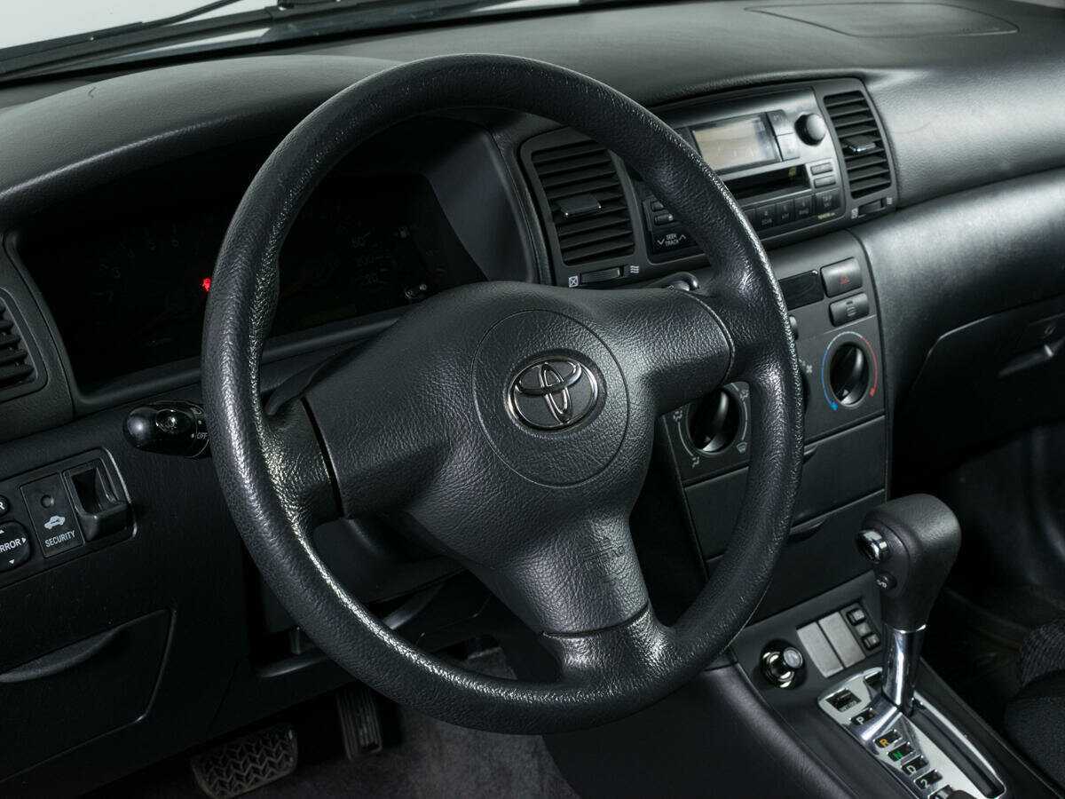 Б/У Тойота Королла 2004 года. Фото: #11