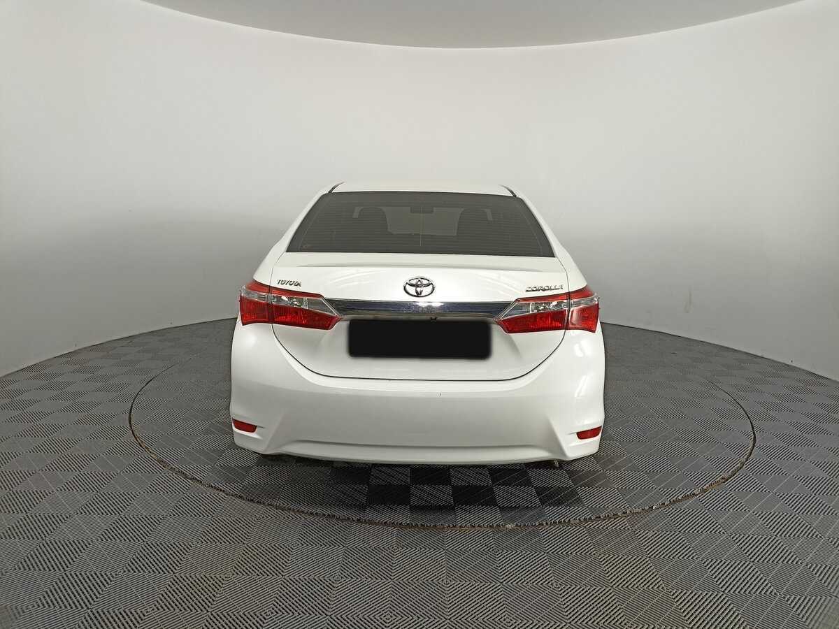 Б/У Тойота Королла 2013 года. Фото: #5