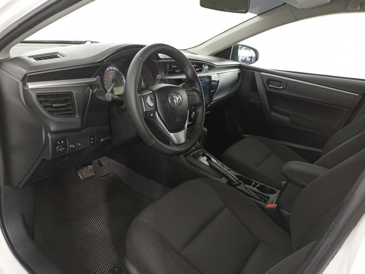 Б/У Тойота Королла 2013 года. Фото: #15