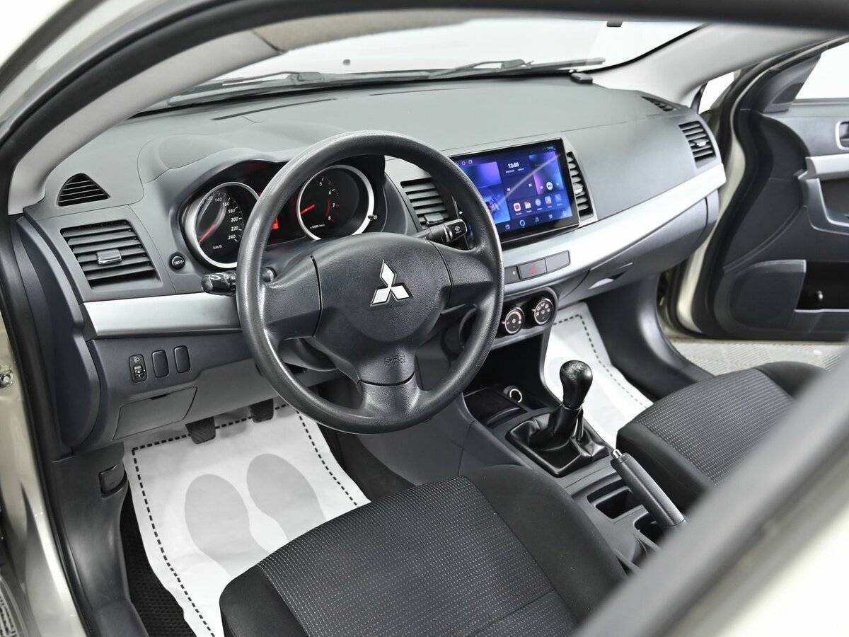 Б/У Митсубиши Лансер 2010 года. Фото: #7