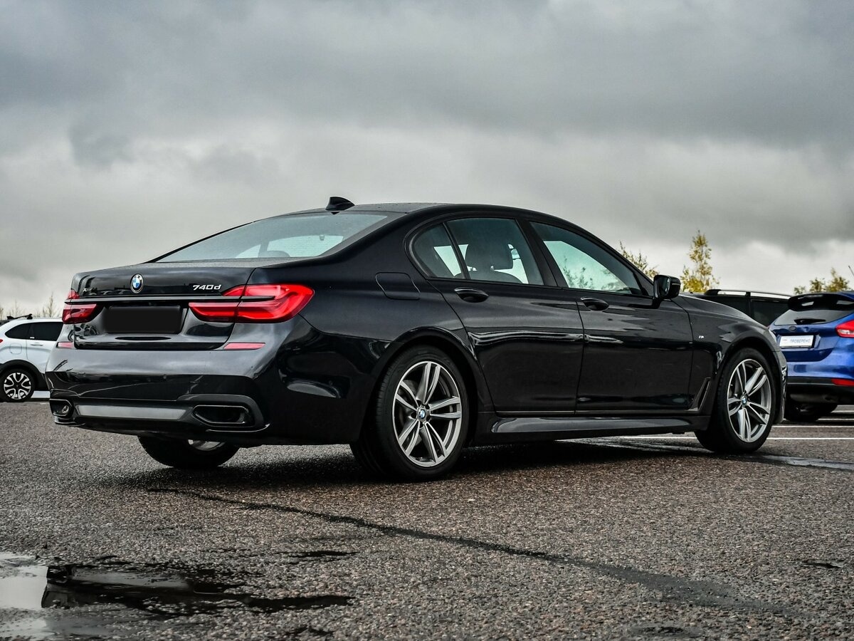 Б/У БМВ 7 серии 2018 года. Фото: #4