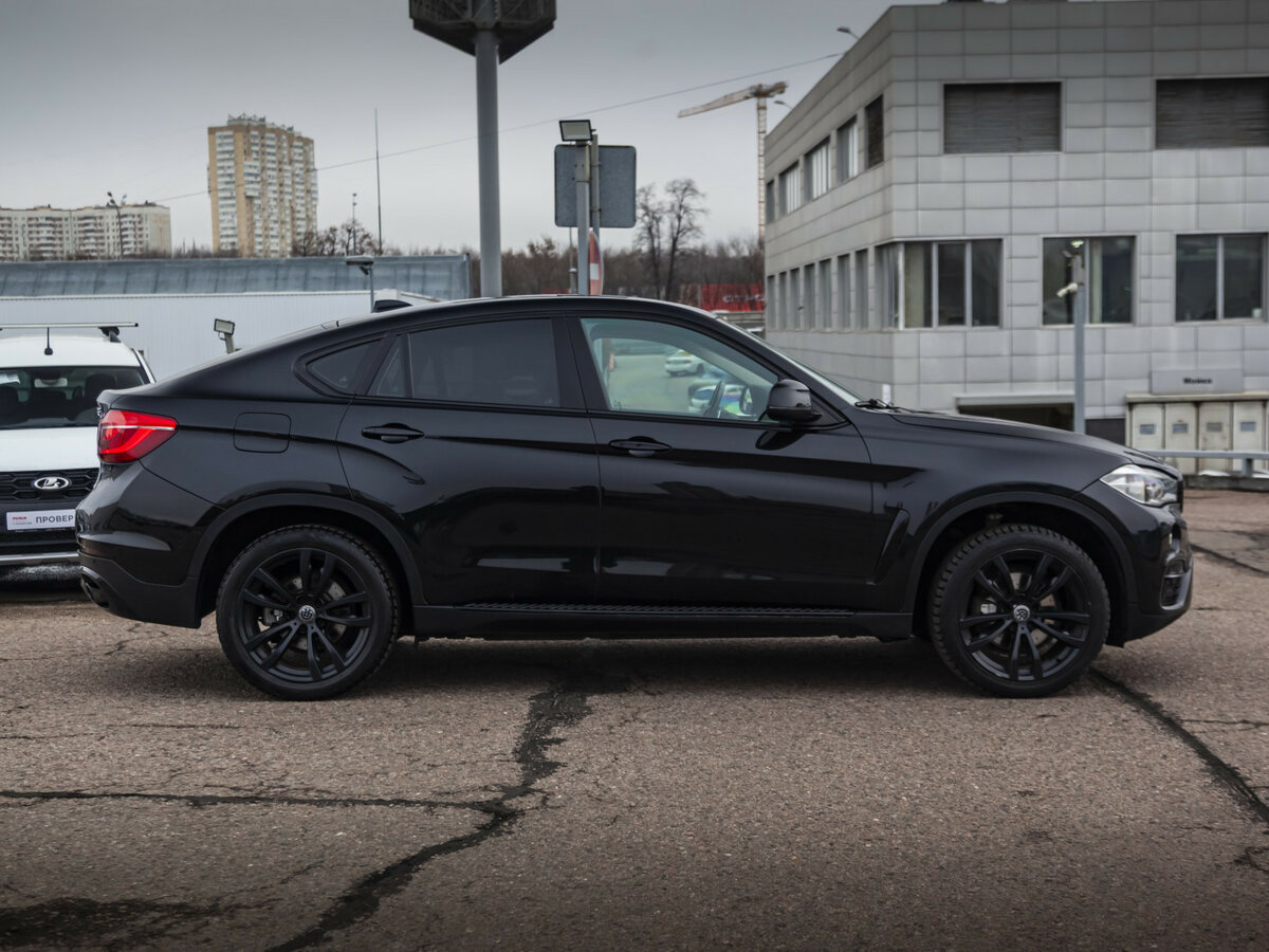 Б/У БМВ Икс6 2016 года. Фото: #4